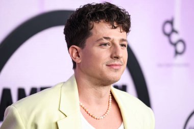 Charlie Puth arrives at the 2022 American Music Awards (50th Annual American Music Awards) held at Microsoft Theater at L.A. Live on November 20, 2022 in Los Angeles, California, United States.