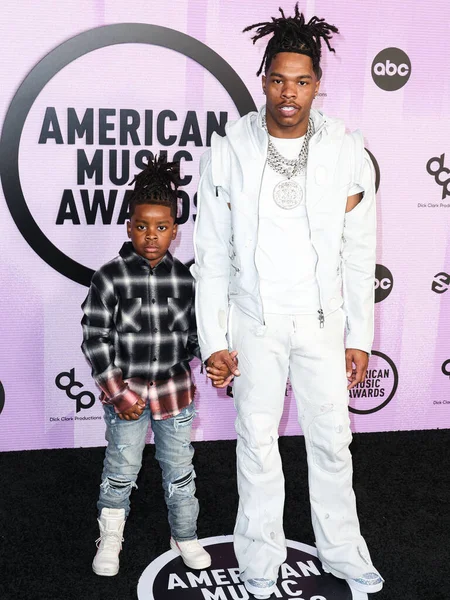 stock image Jason Jones and Lil Baby (Dominique Armani Jones) arrive at the 2022 American Music Awards (50th Annual American Music Awards) held at Microsoft Theater at L.A. Live on November 20, 2022 in Los Angeles, California, United States.