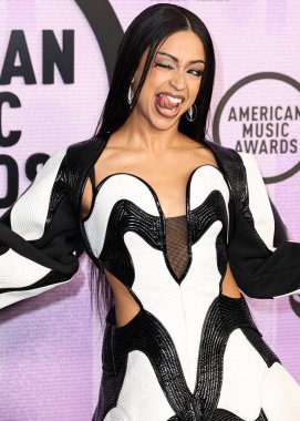 Liza Koshy arrives at the 2022 American Music Awards (50th Annual American Music Awards) held at Microsoft Theater at L.A. Live on November 20, 2022 in Los Angeles, California, United States. clipart