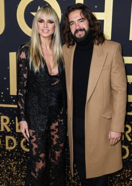 Heidi Klum and Tom Kaulitz arrive at Disney+'s 'Elton John Live: Farewell From Dodger Stadium' Yellow Brick Road Event held at Dodger Stadium on November 20, 2022 in Elysian Park, Los Angeles, California, United States. clipart