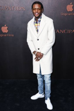 DC Young Fly arrives at the Los Angeles Premiere Of Apple Original Films' 'Emancipation' held at Regency Village Theatre on November 30, 2022 in Westwood, Los Angeles, California, United States.