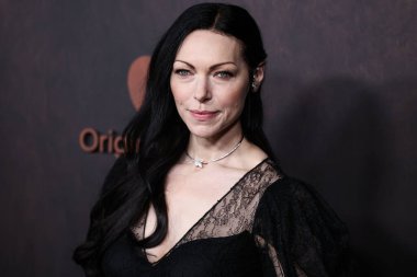 Pamella Rolland tulumu giyen Amerikalı aktris Laura Prepon, Stuart Weitzman ayakkabıları ve Pascale Bruni mücevherleri 30 Kasım 2022 'de Regency Village Theatre' da düzenlenen Los Angeles Orijinal Filmler 'Özgürlük' filminin galasına geldi. 