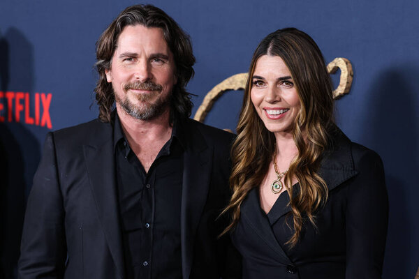 English actor Christian Bale and wife - American actress Sibi Blazic arrive at the Los Angeles Premiere Of Netflix's 'The Pale Blue Eye' held at the Directors Guild of America Theater Complex on December 14, 2022 in Los Angeles, California, USA