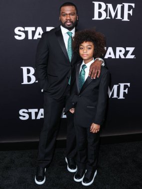 Amerikalı rapçi, aktör ve işadamı 50 Cent (Curtis James Jackson III) ve oğlu Sire Jackson, STARZ 'ın' BMF '(Black Mafia Family) sezonunun Los Angeles Premiere' ine 5 Ocak 2023 'te ABD' nin Los Angeles kentinde düzenlenen TCL Çin Tiyatrosu IMAX 'e geldiler..