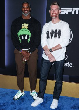 Roman Harper and Marty Smith arrive at ESPN And CFP's Allstate Party At The Playoff Event 2023 held at The Majestic Downtown on January 7, 2023 in Los Angeles, California, United States. clipart