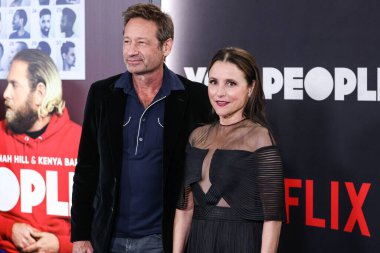 David Duchovny and Julia Louis-Dreyfus arrive at the Los Angeles Premiere Of Netflix's 'You People' held at the Regency Village Theatre on January 17, 2023 in Westwood, Los Angeles, California, United States. 