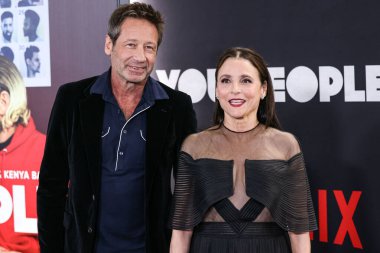 David Duchovny and Julia Louis-Dreyfus arrive at the Los Angeles Premiere Of Netflix's 'You People' held at the Regency Village Theatre on January 17, 2023 in Westwood, Los Angeles, California, United States. 