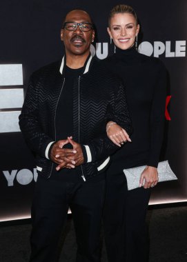 Eddie Murphy and girlfriend Paige Butcher arrive at the Los Angeles Premiere Of Netflix's 'You People' held at the Regency Village Theatre on January 17, 2023 in Westwood, Los Angeles, California, United States. 