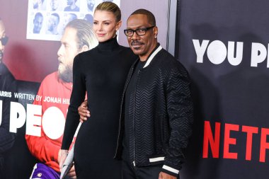 Paige Butcher and boyfriend Eddie Murphy arrive at the Los Angeles Premiere Of Netflix's 'You People' held at the Regency Village Theatre on January 17, 2023 in Westwood, Los Angeles, California, United States. 