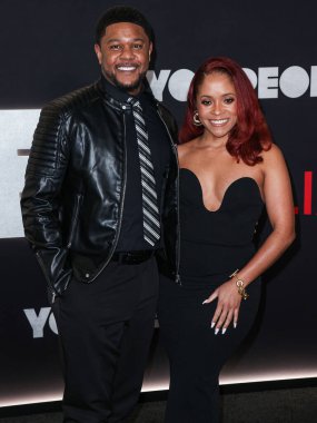 Pooch Hall and Brittany Baker arrive at the Los Angeles Premiere Of Netflix's 'You People' held at the Regency Village Theatre on January 17, 2023 in Westwood, Los Angeles, California, United States. 