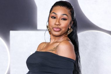 American rapper/actress Yung Miami (Caresha Romeka Brownlee) arrives at the Los Angeles Premiere Of Netflix's 'You People' held at the Regency Village Theatre on January 17, 2023 in Westwood, Los Angeles, California, United States. 