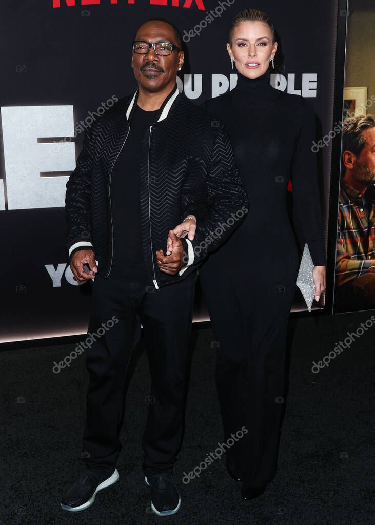 Eddie Murphy and girlfriend Paige Butcher arrive at the Los Angeles