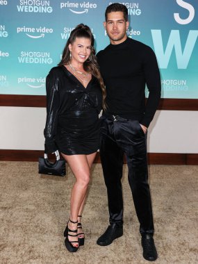 Chanel West Coast and Dom Fenison arrive at the Los Angeles Premiere Of Amazon Prime Video's 'Shotgun Wedding' held at the TCL Chinese Theatre IMAX on January 18, 2023 in Hollywood, Los Angeles, California, United States.