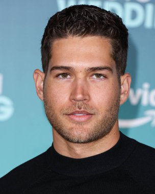 Dom Fenison arrives at the Los Angeles Premiere Of Amazon Prime Video's 'Shotgun Wedding' held at the TCL Chinese Theatre IMAX on January 18, 2023 in Hollywood, Los Angeles, California, United States.