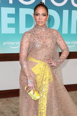Jennifer Lopez (J.Lo) wearing a Valentino sheer dress arrives at the Los Angeles Premiere Of Amazon Prime Video's 'Shotgun Wedding' held at the TCL Chinese Theatre IMAX on January 18, 2023 in Hollywood, Los Angeles