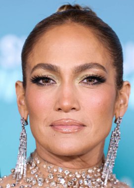 Jennifer Lopez (J.Lo) wearing a Valentino sheer dress arrives at the Los Angeles Premiere Of Amazon Prime Video's 'Shotgun Wedding' held at the TCL Chinese Theatre IMAX on January 18, 2023 in Hollywood, Los Angeles