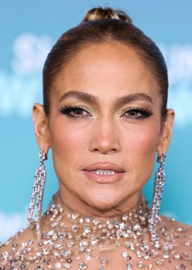 Jennifer Lopez (J.Lo) wearing a Valentino sheer dress arrives at the Los Angeles Premiere Of Amazon Prime Video's 'Shotgun Wedding' held at the TCL Chinese Theatre IMAX on January 18, 2023 in Hollywood, Los Angeles
