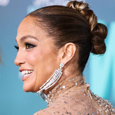 Jennifer Lopez (J.Lo) wearing a Valentino sheer dress arrives at the Los Angeles Premiere Of Amazon Prime Video's 'Shotgun Wedding' held at the TCL Chinese Theatre IMAX on January 18, 2023 in Hollywood, Los Angeles