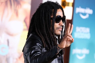 American singer-songwriter Lenny Kravitz arrives at the Los Angeles Premiere Of Amazon Prime Video's 'Shotgun Wedding' held at the TCL Chinese Theatre IMAX on January 18, 2023 in Hollywood, Los Angeles, California, United States.  clipart