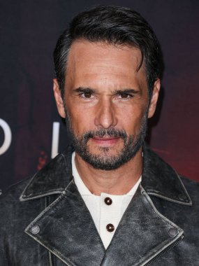 Brazilian actor Rodrigo Santoro wearing Golden Goose arrives at the Los Angeles Premiere Of Paramount+'s 'Wolf Pack' Season 1 held at the Harmony Gold Theater on January 19, 2023 in Los Angeles, California, United States.