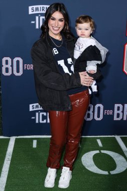 Ashley Iaconetti Haibon with baby arrives at the Los Angeles Premiere Screening Of Paramount Pictures' '80 For Brady' held at the Regency Village Theatre on January 31, 2023 in Westwood, Los Angeles, California, United States.