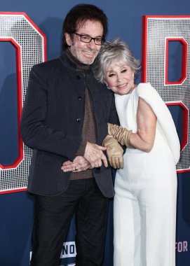 Rita Moreno and George Chakiris arrive at the Los Angeles Premiere Screening Of Paramount Pictures' '80 For Brady' held at the Regency Village Theatre on January 31, 2023 in Westwood, Los Angeles, California, United States.