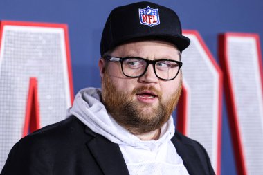 American actor and comedian Paul Walter Hauser arrives at the Los Angeles Premiere Screening Of Paramount Pictures' '80 For Brady' held at the Regency Village Theatre on January 31, 2023 in Westwood, Los Angeles, California, United States. clipart