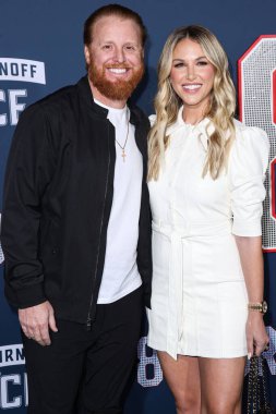 American professional baseball Justin Turner and wife Kourtney Pogue Turner arrive at the Los Angeles Premiere Screening Of Paramount Pictures' '80 For Brady' held at the Regency Village Theatre on January 31, 2023 in Westwood, LA, California, USA