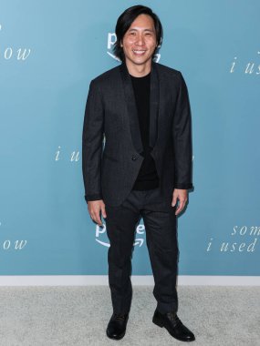 American actor and writer Kelvin Yu arrives at the Los Angeles Premiere Of Amazon Prime Video's 'Somebody I Used To Know' held at The Culver Theater on February 1, 2023 in Culver City, Los Angeles, California, United States. clipart