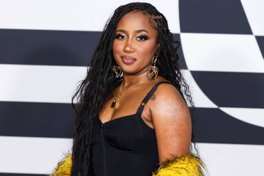 Baby Tate arrives at the Warner Music Group Pre-Grammy Party 2023 held at the Hollywood Athletic Club on February 2, 2023 in Hollywood, Los Angeles, California, United States.