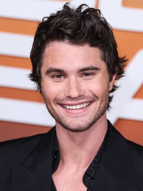 American actor Chase Stokes arrives at the Los Angeles Premiere Of Netflix's 'Outer Banks' Season 3 held at the Regency Village Theatre on February 16, 2023 in Westwood, Los Angeles, California, United States. 