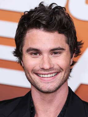 American actor Chase Stokes arrives at the Los Angeles Premiere Of Netflix's 'Outer Banks' Season 3 held at the Regency Village Theatre on February 16, 2023 in Westwood, Los Angeles, California, United States. 