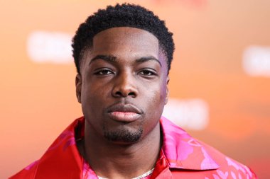 American actor Deion Smith arrives at the Los Angeles Premiere Of Netflix's 'Outer Banks' Season 3 held at the Regency Village Theatre on February 16, 2023 in Westwood, Los Angeles, California, United States. 