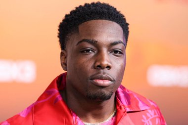 American actor Deion Smith arrives at the Los Angeles Premiere Of Netflix's 'Outer Banks' Season 3 held at the Regency Village Theatre on February 16, 2023 in Westwood, Los Angeles, California, United States. 