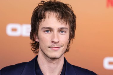 American actor Drew Starkey arrives at the Los Angeles Premiere Of Netflix's 'Outer Banks' Season 3 held at the Regency Village Theatre on February 16, 2023 in Westwood, Los Angeles, California, United States. 