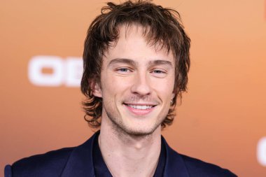 American actor Drew Starkey arrives at the Los Angeles Premiere Of Netflix's 'Outer Banks' Season 3 held at the Regency Village Theatre on February 16, 2023 in Westwood, Los Angeles, California, United States. 