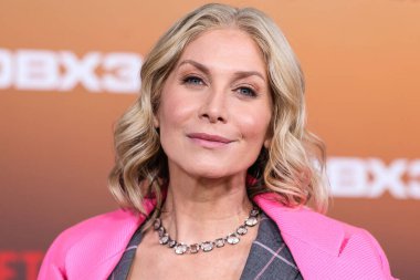Elizabeth Mitchell arrives at the Los Angeles Premiere Of Netflix's 'Outer Banks' Season 3 held at the Regency Village Theatre on February 16, 2023 in Westwood, Los Angeles, California, United States. 