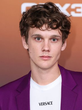 American actor Hunter Doohan arrives at the Los Angeles Premiere Of Netflix's 'Outer Banks' Season 3 held at the Regency Village Theatre on February 16, 2023 in Westwood, Los Angeles, California, United States. 