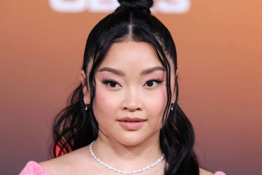 American actress Lana Condor arrives at the Los Angeles Premiere Of Netflix's 'Outer Banks' Season 3 held at the Regency Village Theatre on February 16, 2023 in Westwood, Los Angeles, California, United States. 