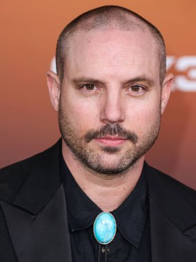 Michael Aaron Milligan arrives at the Los Angeles Premiere Of Netflix's 'Outer Banks' Season 3 held at the Regency Village Theatre on February 16, 2023 in Westwood, Los Angeles, California, United States. 