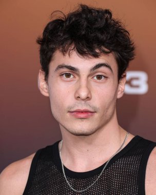 Nicholas Cirillo arrives at the Los Angeles Premiere Of Netflix's 'Outer Banks' Season 3 held at the Regency Village Theatre on February 16, 2023 in Westwood, Los Angeles, California, United States.