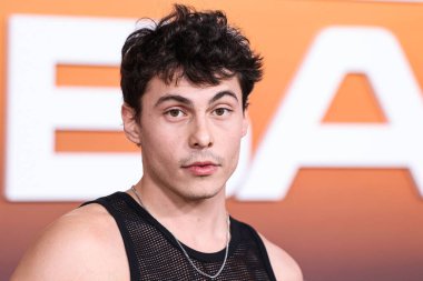 Nicholas Cirillo arrives at the Los Angeles Premiere Of Netflix's 'Outer Banks' Season 3 held at the Regency Village Theatre on February 16, 2023 in Westwood, Los Angeles, California, United States.