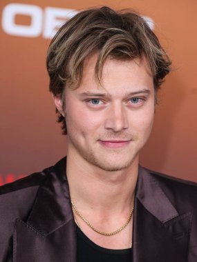 American actor Rudy Pankow arrives at the Los Angeles Premiere Of Netflix's 'Outer Banks' Season 3 held at the Regency Village Theatre on February 16, 2023 in Westwood, Los Angeles, California, United States. 