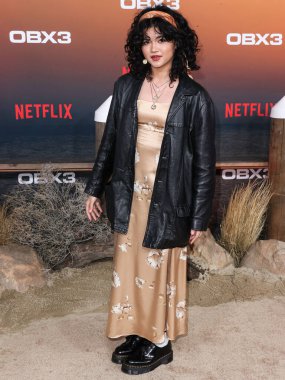 Sam Morelos arrives at the Los Angeles Premiere Of Netflix's 'Outer Banks' Season 3 held at the Regency Village Theatre on February 16, 2023 in Westwood, Los Angeles, California, United States. 