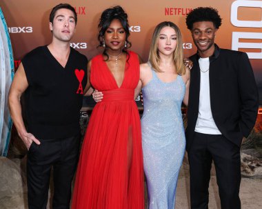 Austin North, Carlacia Grant, Madelyn Cline and Jonathan Daviss arrive at the Los Angeles Premiere Of Netflix's 'Outer Banks' Season 3 held at the Regency Village Theatre on February 16, 2023 in Westwood, Los Angeles, California, United States. 