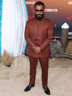 Andy McQueen arrives at the Los Angeles Premiere Of Netflix's 'Outer Banks' Season 3 held at the Regency Village Theatre on February 16, 2023 in Westwood, Los Angeles, California, United States. 