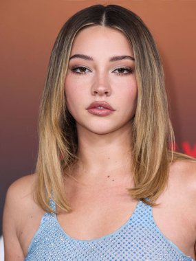 American actress and model Madelyn Cline arrives at the Los Angeles Premiere Of Netflix's 'Outer Banks' Season 3 held at the Regency Village Theatre on February 16, 2023 in Westwood, Los Angeles, California, United States. 