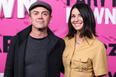 Joe Lo Truglio and Beth Dover arrive at the Los Angeles Premiere Of STARZ's 'Party Down' Season 3 held at the Regency Bruin Theatre on February 22, 2023 in Westwood, Los Angeles, California, United States.