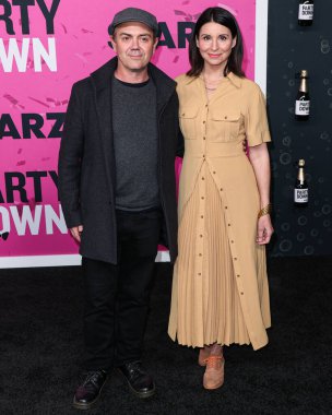 Joe Lo Truglio and Beth Dover arrive at the Los Angeles Premiere Of STARZ's 'Party Down' Season 3 held at the Regency Bruin Theatre on February 22, 2023 in Westwood, Los Angeles, California, United States.