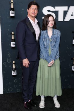 Ken Marino and Ruby Marino arrive at the Los Angeles Premiere Of STARZ's 'Party Down' Season 3 held at the Regency Bruin Theatre on February 22, 2023 in Westwood, Los Angeles, California, United States.